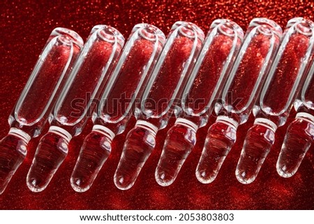 Glass medical ampoules for injection.  Ampoules with vaccine, medicine, collagen, vitamins, clear liquid