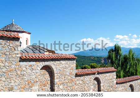 Rustic stone wall around the monastery in Rajcica