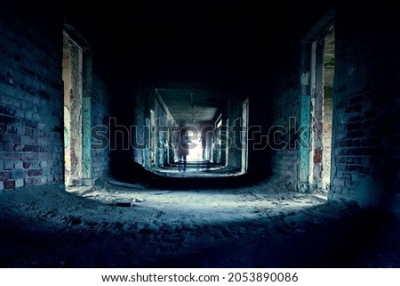 abandoned creepy corridor with ghoast in szentkirályszabadja Hungary ghost tour . Royalty-Free Stock Photo #2053890086