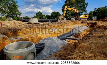 public works, construction of subdivision, passage of pipes Royalty-Free Stock Photo #2053892666