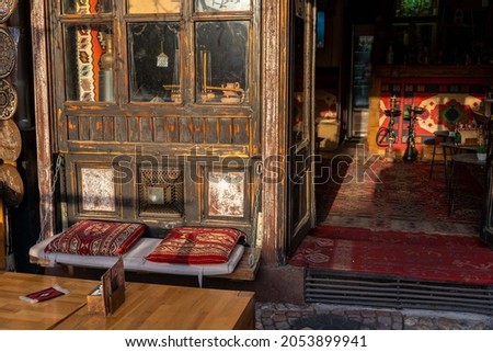 Traditional hookah bar cafe in Sarajevo Royalty-Free Stock Photo #2053899941