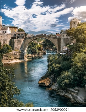 Very popular "Stari most" old bridge in Mostar over Neretva river Royalty-Free Stock Photo #2053900094