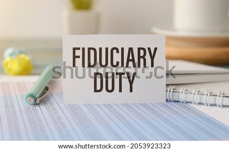 Paper with Fiduciary duty on a table
