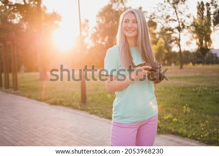 Portrait of attractive cheerful grey-haired woman using cam making snap landscape artwork inspiration art work amateur hobby outdoors