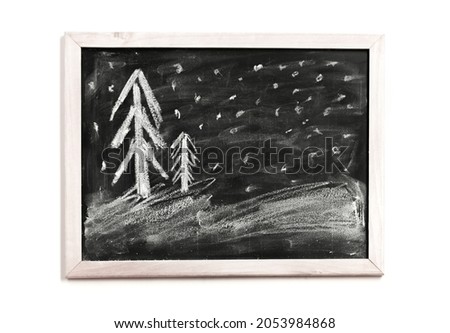 Christmas children chalk drawing on black chalkboard