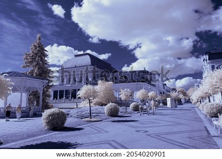 infrared photography - surreal ir photo of landscape with trees under cloudy sky - the art of our world and plants in the invisible infrared camera spectrum