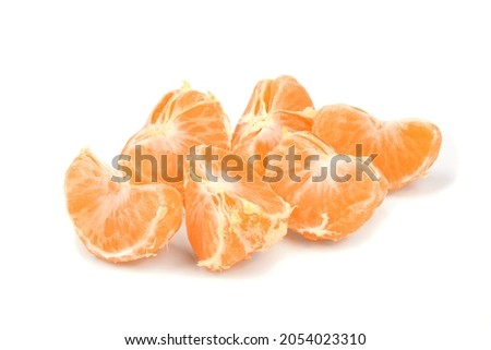 Ripe orange fresh mandarin, mandarin slices, isolated on white background. High resolution photo. Full depth of field.