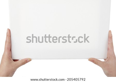 Hands holding blank canvas. Copy space