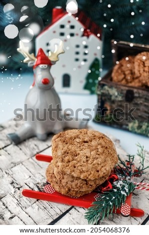 Homemade ginger cookies are on the Christmas table. Festive home decoration. Christmas card.