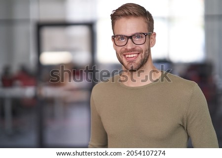 Businessman in glasses working in business company