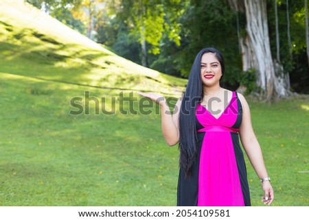 Hispanic woman showing her left hand