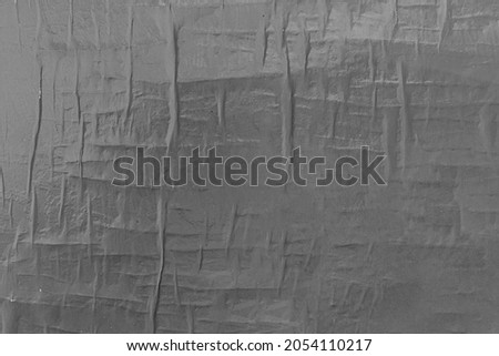 Clean paper ripped torn background blank creased crumpled posters placard. Mockup grunge urban texture surface backdrop empty space.