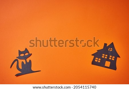 Happy Halloween. Scary black cat. Cute cartoon spooky character. Horror house on Orange background Greeting card. Flat design. Place for text. Design for Web ads, promo sales, social media, fall offer