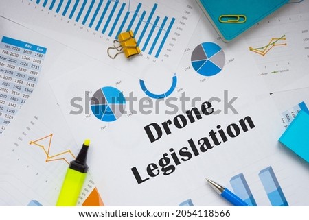  Drone Legislation inscription on the piece of paper. 
