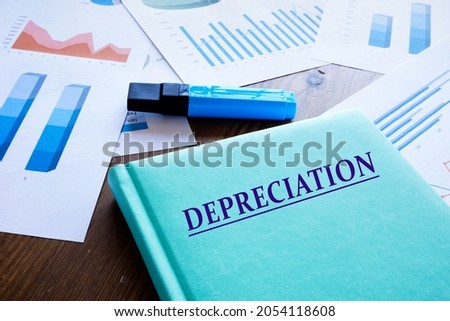 Financial concept meaning DEPRECIATION with inscription on the book cover. 
 Royalty-Free Stock Photo #2054118608