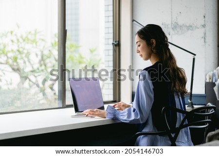 Working woman (home and telework office) Royalty-Free Stock Photo #2054146703