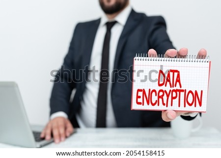 Hand writing sign Data Encryption. Concept meaning Symmetrickey algorithm for the encrypting electronic data Remote Office Work Online Presenting Business Plan And Designs