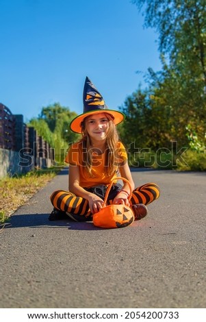 Halloween holiday, child girl in costume. Selective focus. Kid.