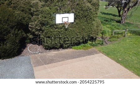 drone shot of driveway basketball hoop