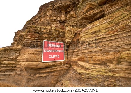 Cliff face with warning sign