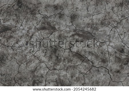 Dry, cracked dirt texture for creative background.