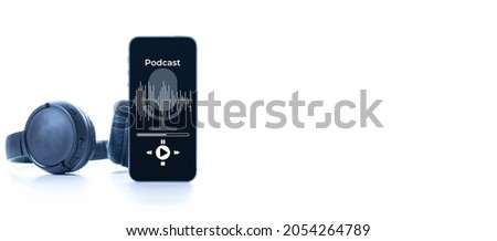 Podcast icon. Audio equipment with microphone, sound headphones, podcast application on mobile smartphone screen. Radio recording sound voice on white background. Broadcast media music concept Royalty-Free Stock Photo #2054264789