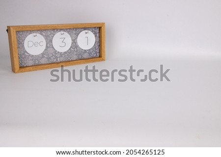 Wooden calendar block on a white background saying the date December 31t, New Years eve concept
