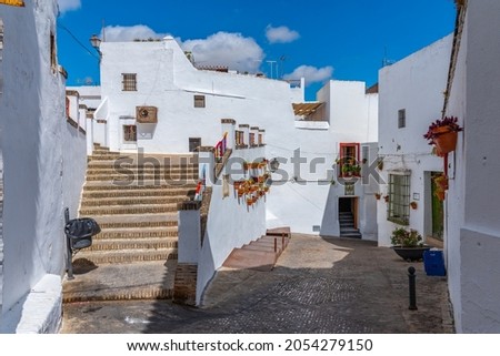 Whitewashed street of the old town of Arcos de la Frontera, one of pueblos blancos, in Spain Royalty-Free Stock Photo #2054279150