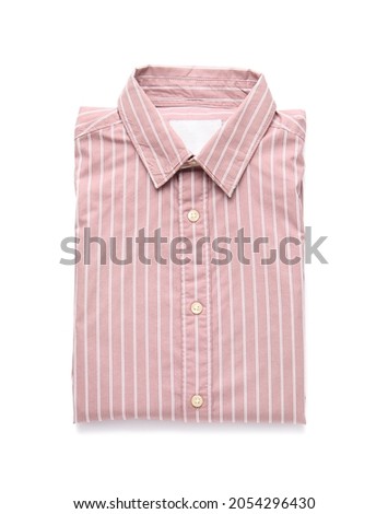Folded male shirt on white background