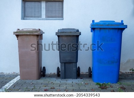 Garbage cans in different colors
