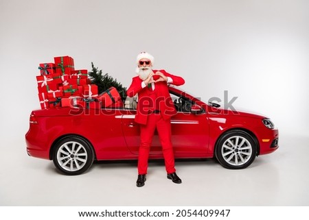 Full body photo of retired pensioner white haired man model sunglass hat make heart car gift isolated on grey color background