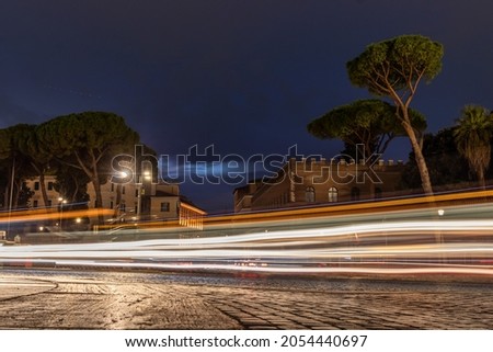 Cool long exposure bus traffic neon blue-orange light trails, night view on the street road, Rome, Italy
 Royalty-Free Stock Photo #2054440697
