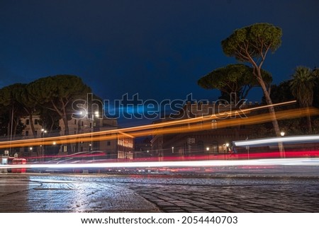Cool long exposure bus traffic neon blue-orange light trails, night view on the street road, Rome, Italy
 Royalty-Free Stock Photo #2054440703