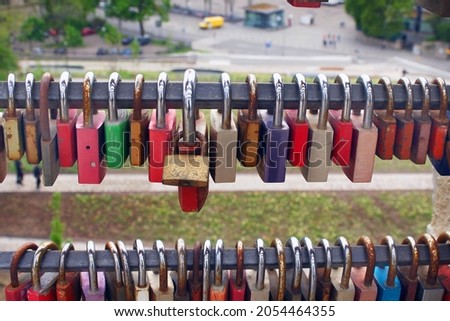 padlocks on a bridge close up