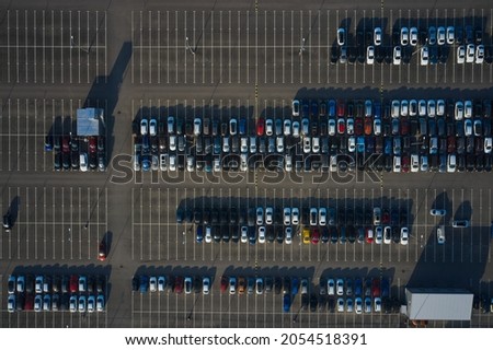 Aerial shoot of big parking with new different cars