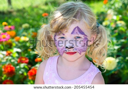 beautiful blond girl with face painting