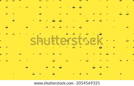 Seamless background pattern of evenly spaced black rowan berrys of different sizes and opacity. Vector illustration on yellow background with stars