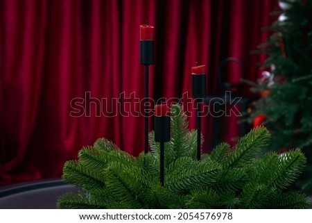 Red candles on table on home modern interior. High quality photo