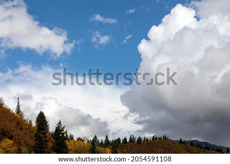 Clouds with blue sky and top of mountain
