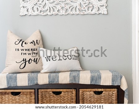 Real Estate accent photo of foyer bench with cute pillows