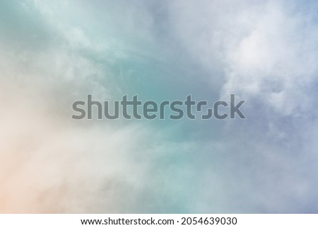 Abstract blurred background in soft pastel tone for aesthetic of autumn and fall design. Autumn sky background.