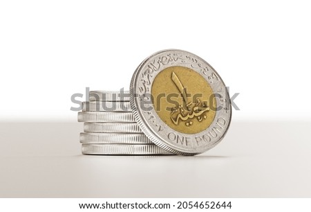 Egyptian Pounds Coins on White Background Royalty-Free Stock Photo #2054652644