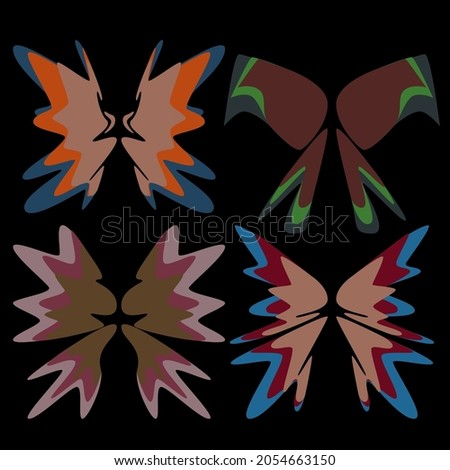 A set of four abstract wings in different bright colors. Vector illustration.
