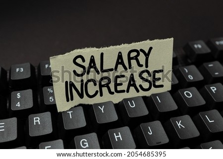 Text sign showing Salary Increase. Business showcase an increase in the salary or pay given to an employee Creating Online Journals, Typing New Articles, Making New Headlines
