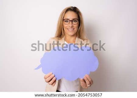 Photo of young attractive woman hold mind paper cloud isolated over white background