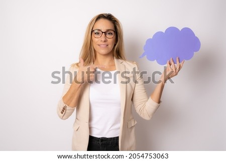 Photo of young attractive woman hold mind paper cloud isolated over white background