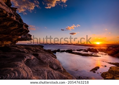 Sunset Scape at Potter Point in Kamay Botany Bay National Park Royalty-Free Stock Photo #2054763218