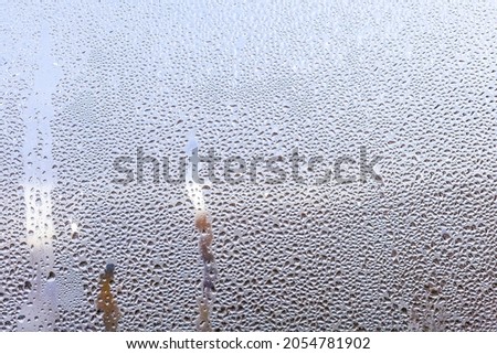 natural drop of water background window glass. raindrops on the window.