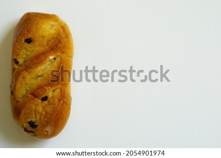 Brown bread on white background