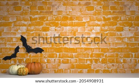 Wall with Halloween decorations, with orange paint
